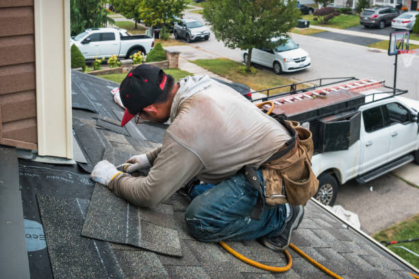 Professional Roofing technician working in New Concord, OH
